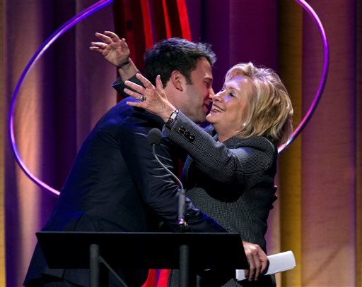 Former Secretary of State Hillary Rodham Clinton embraces actor Ben Affleck at the Clinton Global Initiative's Citizen Awards Dinner, Wednesday, Sept. 25, 2013. He has also donated to her 2016 campaign. AP Photo/Craig Ruttle