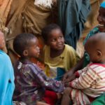 Fadumo with her daughters at their shelter in Walala Biyotey IDP camp. Fadumo swore that she would not let her children undergo FGM after she suffered from the procedure. AU UN IST PHOTO / David Mutua