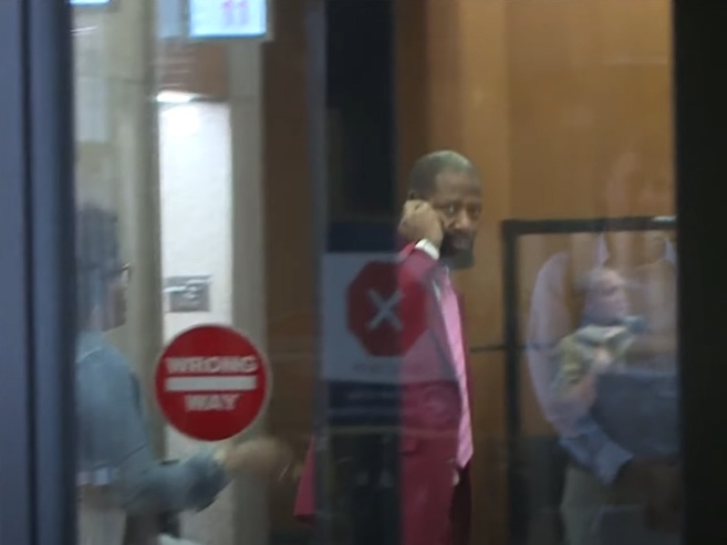 John Thompson departs a Hennepin County courtroom July 14. (Youtube/KARE 11)