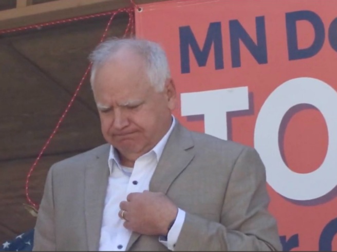 Walz looks dismayed on stage at Saturday's event. (Twitter/Screenshot)