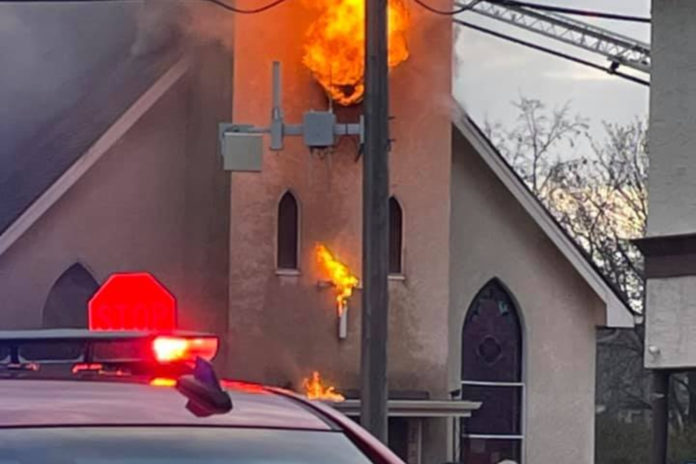 The Sacred Heart of Jesus Catholic Church was apparently set ablaze by an arsonist. (Twitter/CrimeWatchMinneapolis)