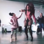 Drag performer Zon Legacy Phoenix dances with a child. (Facebook/ZonLegacyPhoenix)