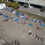 There are about 40 tents in the North Loop homeless camp. (YouTube/WCCO)