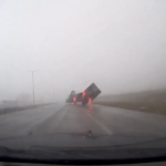A semitrailer (pictured) was turned on its side in Nebraska. A similar incident happened in Iowa, killing the driver. (Nebraska State Patrol/Twitter)