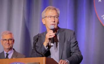 Republican Dr. Scott Jensen speaks at a recent Somali Republican dinner. (Alpha News)