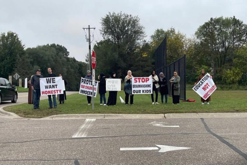 Parents at charter school protest controversial materials, pull kids ...