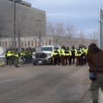 DHS lawyer says Minnesota judges coordinated to block immigration enforcement Protesters and police outside of the Whipple Federal Building in February. The building serves as a local headquarters for ICE. (Photo by Chris Birt)