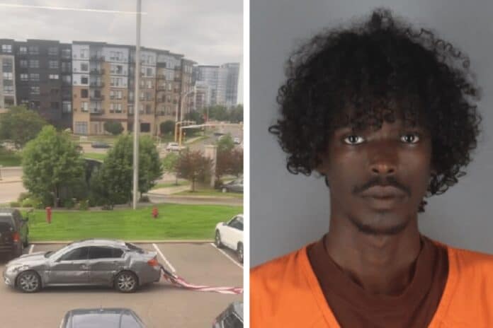 Vandal drags stolen American flag/Mahamud Hassan Mahamed (Submitted to Crime Watch/Hennepin County Jail)