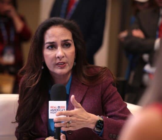 Harmeet Dhillon speaking with the media at the 2022 AmericaFest at the Phoenix Convention Center in Phoenix, Arizona.