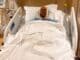 Sammy Kimbrough recovers in a hospital bed after suffering multiple jaw fractures in an assault at the Minnesota State Fair