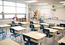 A school classroom with desks