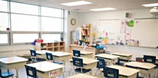 A school classroom with desks