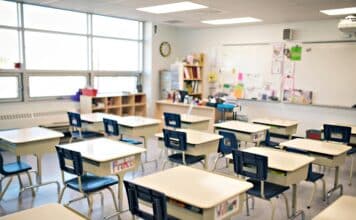 A school classroom with desks