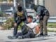 Immigration agents detain a man during a protest outside an ICE processing center in Broadview, Illinois, in September 2025.