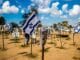 Re'im, Israel – Jan. 5, 2024: A memorial composed of photos of young Israelis killed during the Hamas terrorist attack on the NOVA Festival which took place on October 7, 2023.
