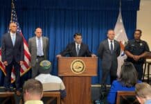 U.S. Attorney Daniel Rosen speaks at a press conference Wednesday to announce the charges.