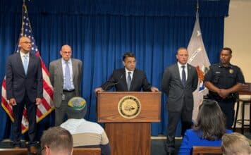 U.S. Attorney Daniel Rosen speaks at a press conference Wednesday to announce the charges.
