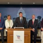 Nicholas Nelson, senior appellate counsel at the Upper Midwest Law Center, speaks at a press conference.