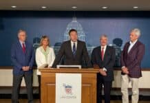 Nicholas Nelson, senior appellate counsel at the Upper Midwest Law Center, speaks at a press conference.