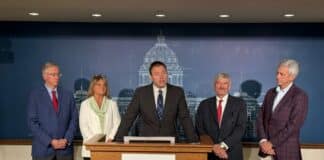 Nicholas Nelson, senior appellate counsel at the Upper Midwest Law Center, speaks at a press conference.