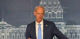 Republican attorney general candidate Ron Schutz speaks at a press conference at the Minnesota Capitol.