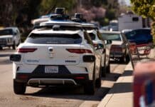 Minneapolis mayor vetoes ordinance that would require ‘human safety monitor’ in driverless vehicles Waymo cars parked along a street in Mountain View, Calif.